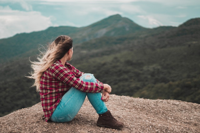 woman sitting thinking