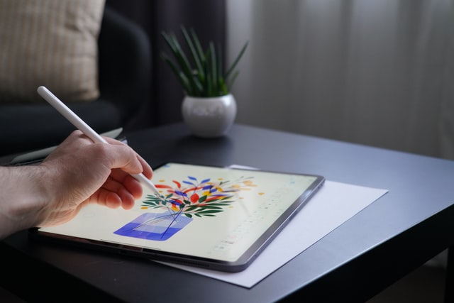 Person making illustrations on iPad